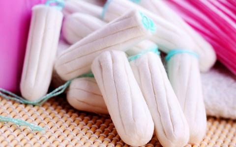 Tampons are a great absorbent device that can store liquid coconut oil.  After you heat coconut oil, you can soak a tampon in it and let it cool.  Using this kind of medicated tampon is great to stop a yeast infection!