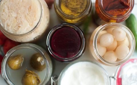 In general, many fermented foods can contain probiotic bacteria.  When it comes to dairy products that have been pasteurized, probiotic cultures need to have been added to the product for a benefit to be seen. 